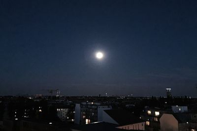 Illuminated cityscape at night