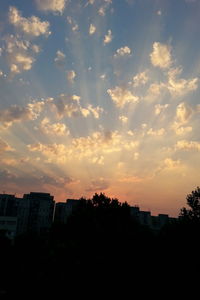 View of buildings at sunset