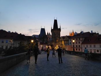 People walking on street in town