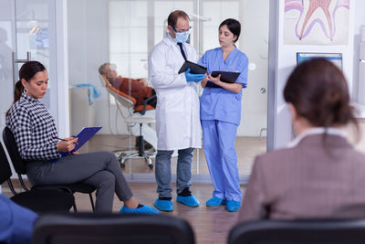 Group of people waiting at hospital