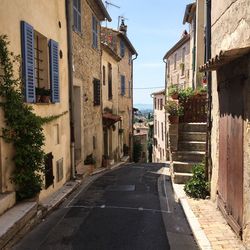 Narrow alley amidst buildings in city