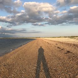 Shadow of people on beach