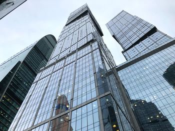 Low angle view of modern buildings against sky