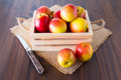 High angle view of apples in basket on table