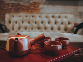 Close-up of tea cup on table