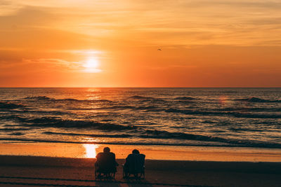 Scenic view of sunset over sea