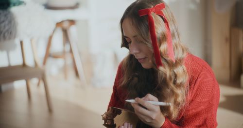 Young woman using mobile phone