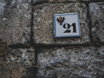 Close-up of text on wall