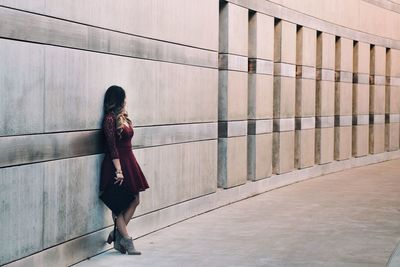 Woman walking on bridge