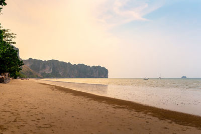 Beautiful sunset at phra nang beach, krabi, thailand.