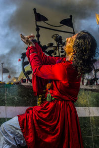 Midsection of women in traditional clothing during festival