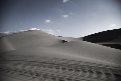 Scenic view of desert against sky