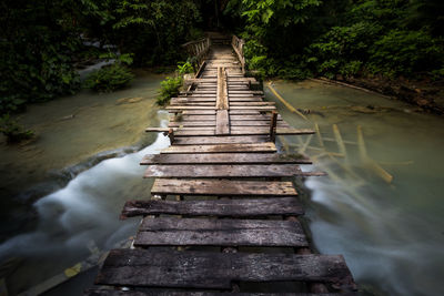 Wooden bridge in forest