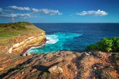 Scenic view of sea against blue sky