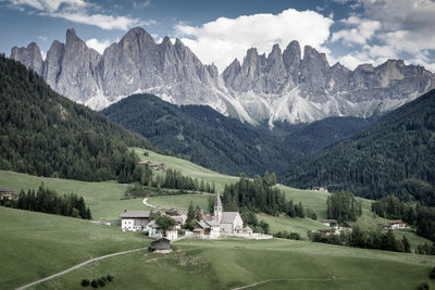 Scenic view of landscape and mountains against sky