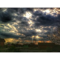 Scenic view of dramatic sky at sunset