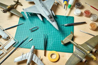 High angle view of toy with paintbrush on table