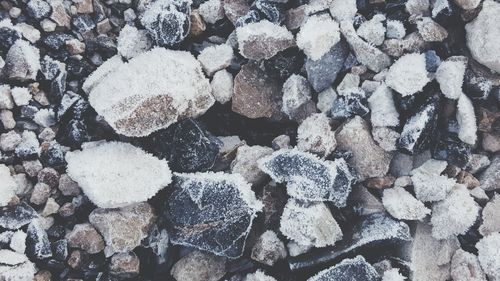 Full frame shot of snow covered stones