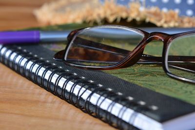 Close-up of eyeglasses on table