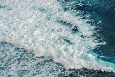 High angle view of waves at sea