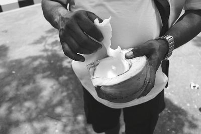 Close-up of man preparing food