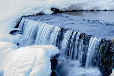 View of frozen waterfall