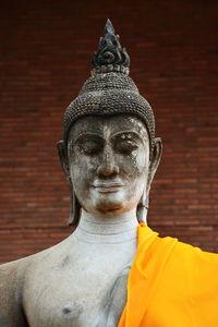 Ancient sculpture of a buddha head in the ayutthaya period
