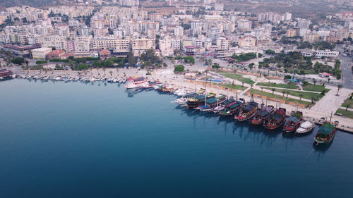 High angle view of townscape by sea