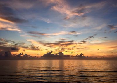 Scenic view of sea at sunset