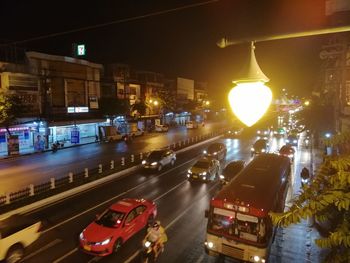 High angle view of traffic on city street at night