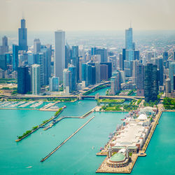 Aerial view of chicago skyline  against sky