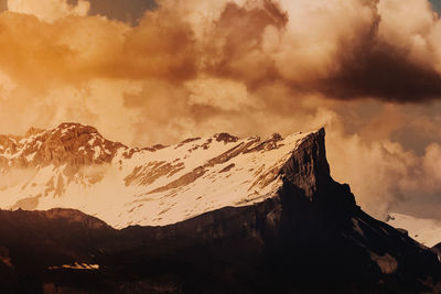 Scenic view of mountains against sky during sunset