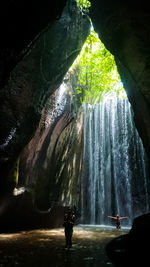 Man standing in cave