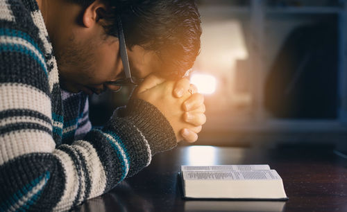 Midsection of mother with baby