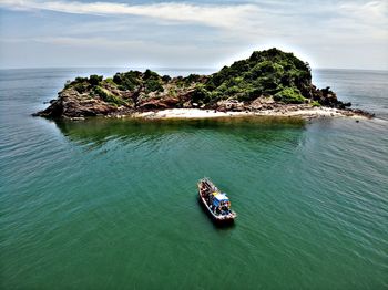 High angle view of rock in sea