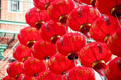 Low angle view of lanterns hanging outdoors