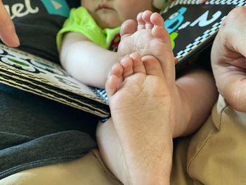 Low section of baby feet