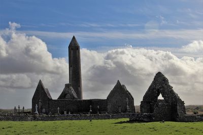 Old building against cloudy sky