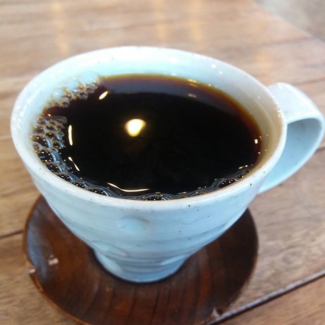 food and drink, drink, table, refreshment, indoors, still life, freshness, close-up, wood - material, drinking glass, focus on foreground, high angle view, coffee cup, wooden, coffee - drink, no people, frothy drink, glass - material, saucer, coffee