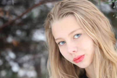 Close-up portrait of young woman