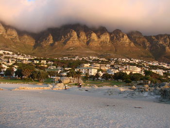 Scenic view of buildings against sky during winter