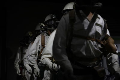 Soldiers wearing uniform at night