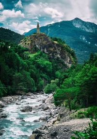 Church on a steep rock with a wild river beneath