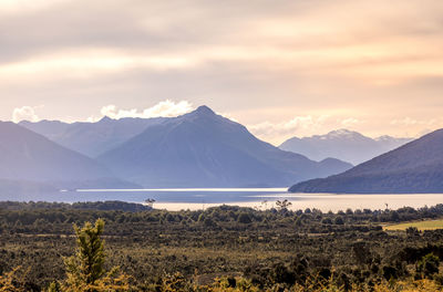 Scenic view of mountains against sky during sunset