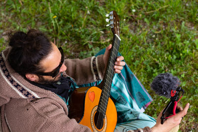 Young man playing guitar