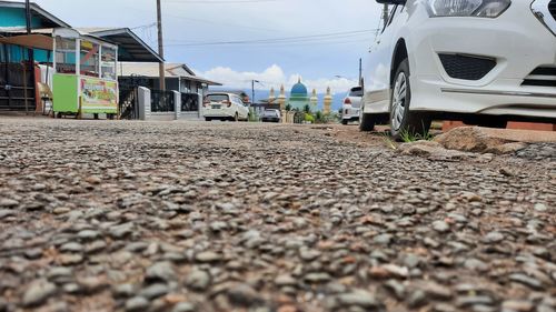 Surface level of road by buildings in city