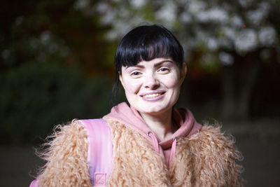 Portrait of a smiling young woman