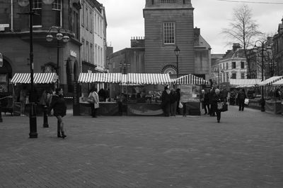 People walking on city street