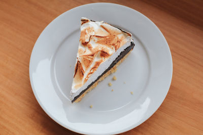 High angle view of cake in plate on table