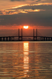 View of suspension bridge at sunset